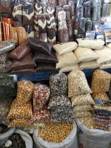 Photo of quinoa and corn for sale.