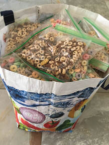 Photograph of cereal snack packs. 