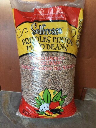 Photo of a 25 lb sack of beans.